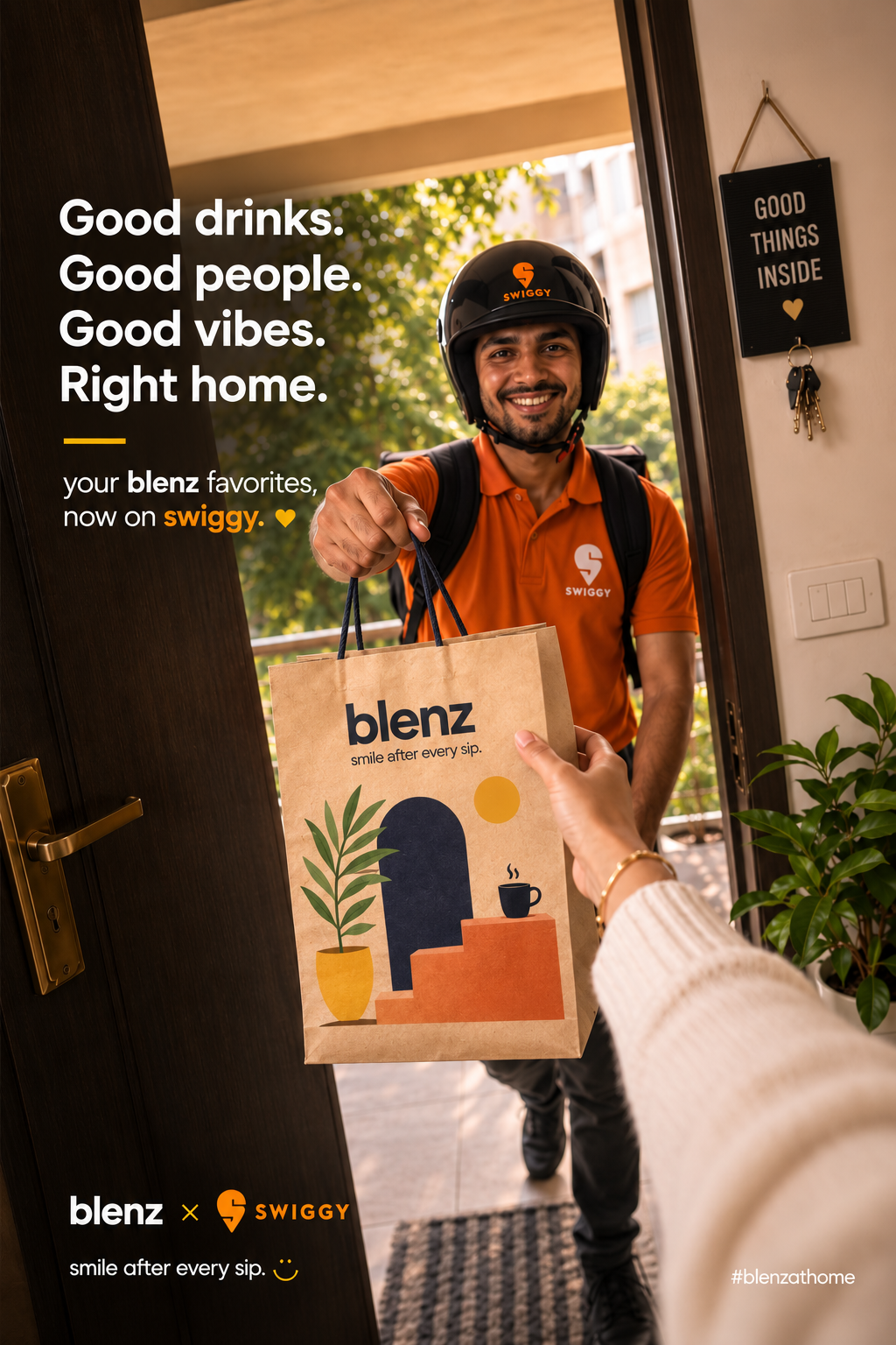 blenz × Swiggy — delivery handover at a home doorway in India
