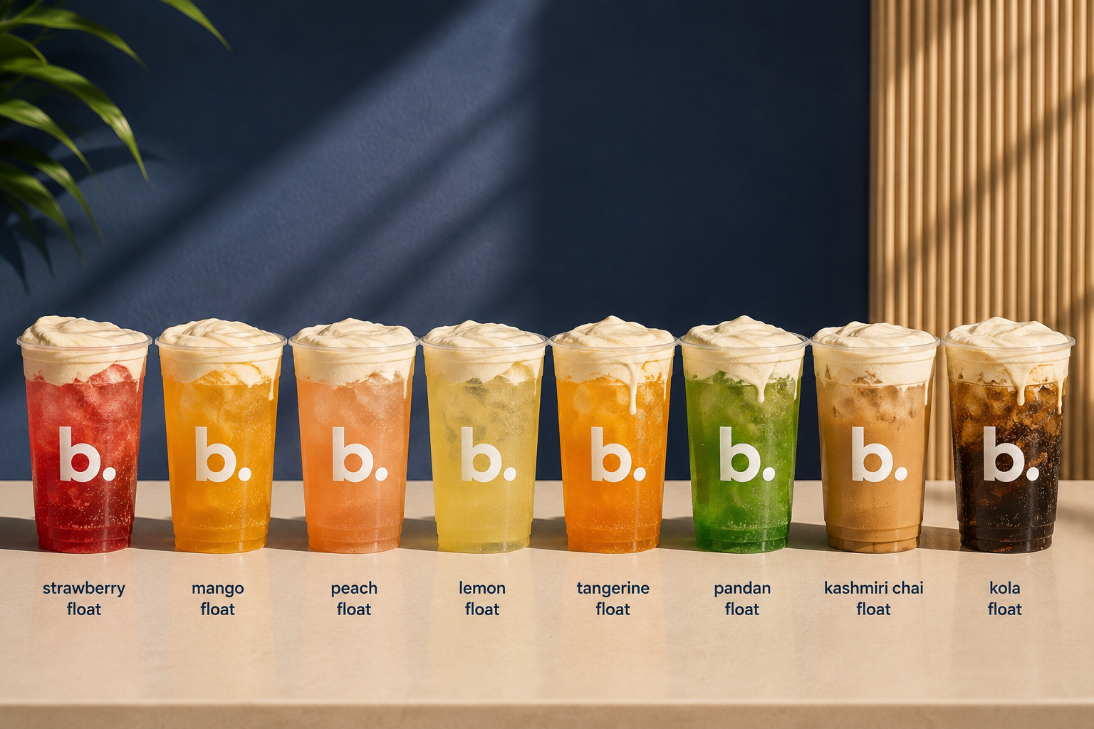 Eight blenz briza floats in a row, strawberry through kola, each labelled